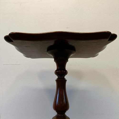 1313 - A 19th century rosewood table, on a carved column support with a tripod base, 74 cm high x 33 cm wid... 