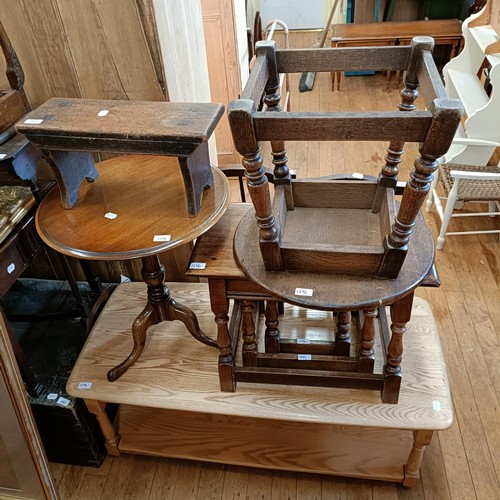 1296 - An Ercol light elm coffee table, 115 cm wide, a nest of tables, two occasional tables, a pair of cha... 