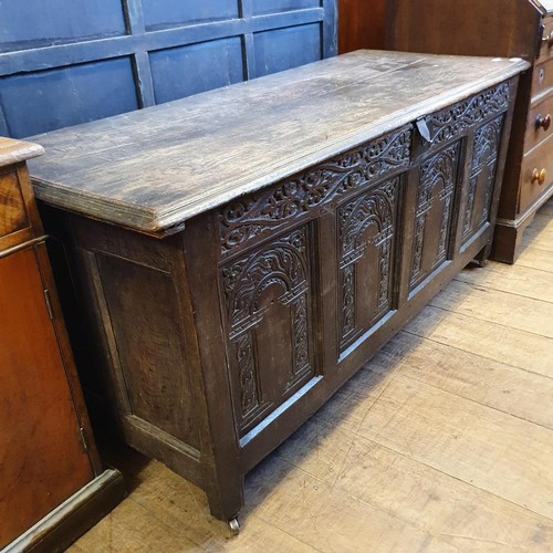 1194 - A 17th century coffer, 150 cm wide