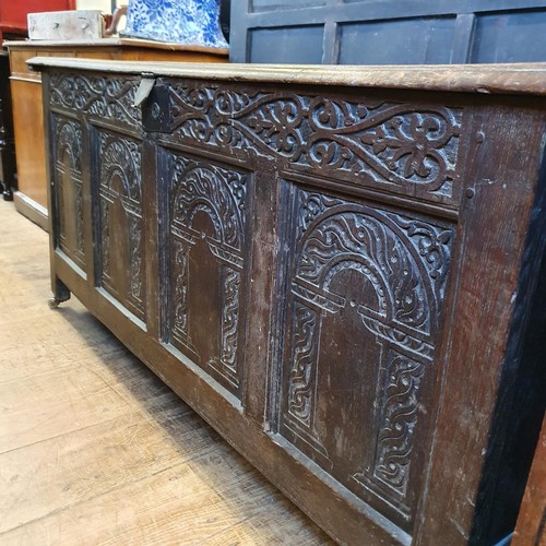 1194 - A 17th century coffer, 150 cm wide