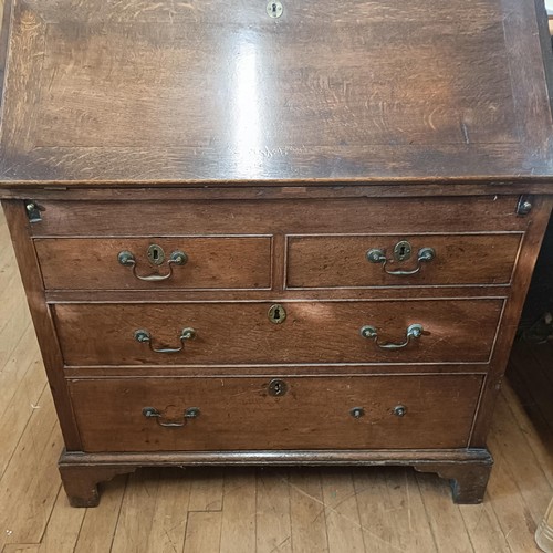 1291 - A 19th century oak bureau, 100 cm wide