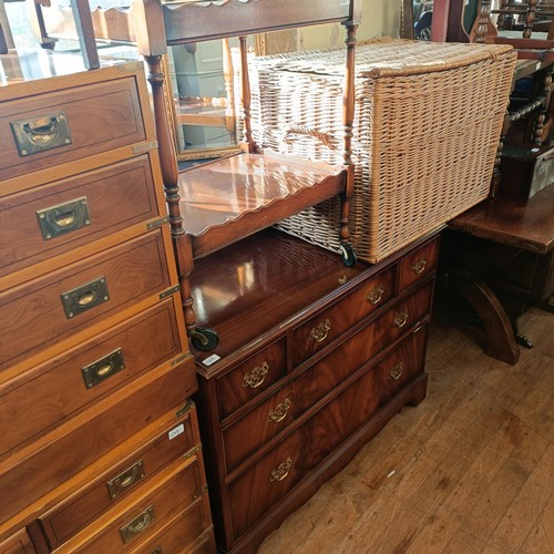 1269 - A pair of yew wood chests, 151 cm wide, a mahogany chest, wicker basket, and assorted furniture (9)