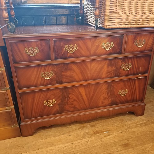 1269 - A pair of yew wood chests, 151 cm wide, a mahogany chest, wicker basket, and assorted furniture (9)