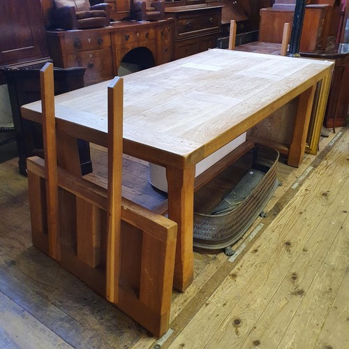 1222 - An oak refectory dining table, the top 95 x 182 cm, with two extra leaves