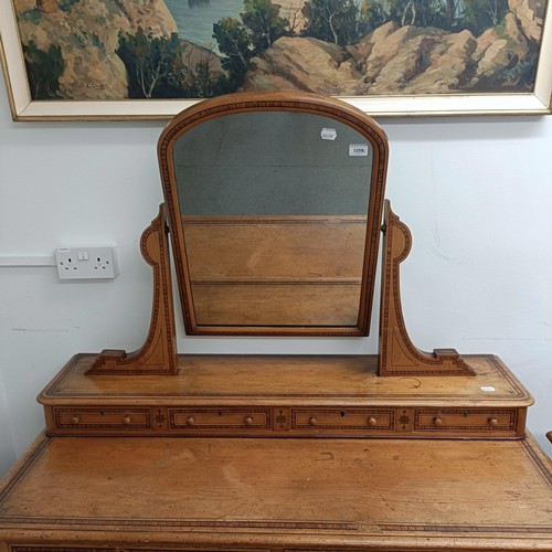 1259 - A Victorian pine dressing table, 125 cm wide and a matching bedside cupboard, 39 cm wide (2)