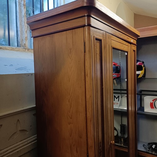 1257 - A Victorian pine wardrobe, with a mirrored door and painted decoration, 128 cm wide