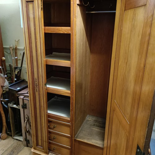 1257 - A Victorian pine wardrobe, with a mirrored door and painted decoration, 128 cm wide