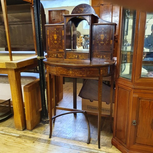 1224 - A early 20th century mahogany ladies' writing desk, the super structure having two cupboard doors, a... 