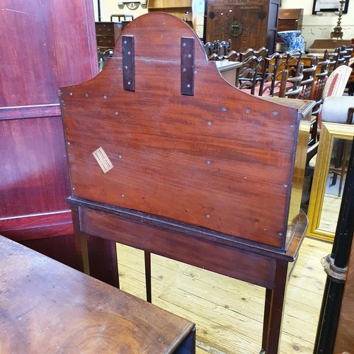 1224 - A early 20th century mahogany ladies' writing desk, the super structure having two cupboard doors, a... 