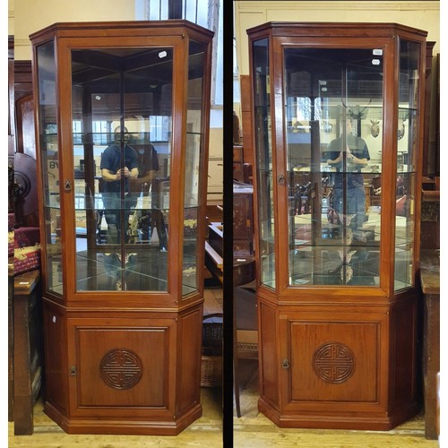 1225 - A pair of Chinese hardwood corner display cabinets, 81 cm wide