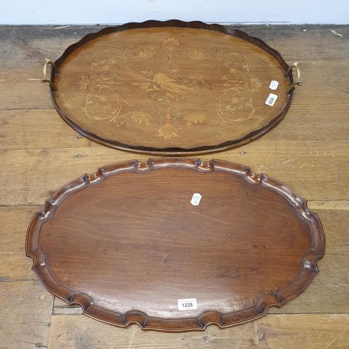 1228 - A mahogany oval tray, 65 cm wide, and another, 67 cm wide (2)