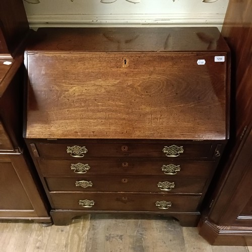 1250 - A 19th century mahogany bureau, 84 cm wide