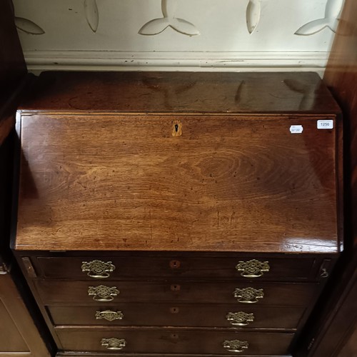 1250 - A 19th century mahogany bureau, 84 cm wide