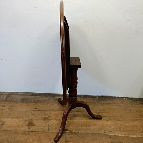 1245 - A 19th century mahogany tilt top table, on a column support tripod base, 80 cm wide, wall lights and... 