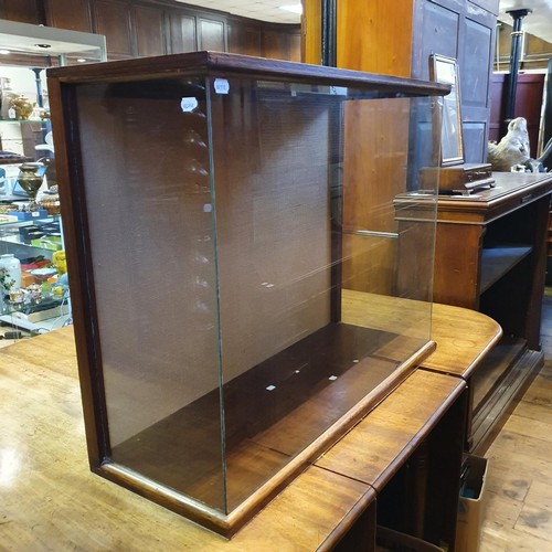 1235 - An oak and glass display case, 102 cm wide