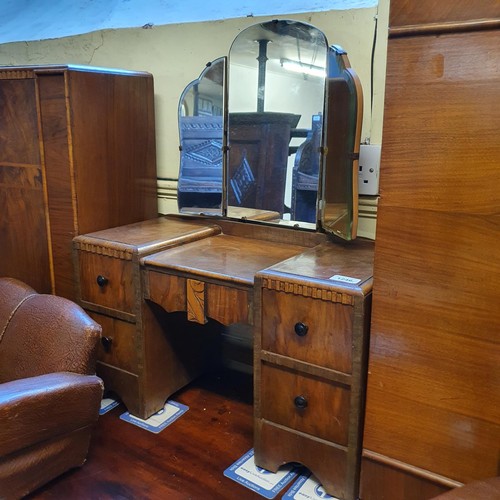 1246 - A miniature Art Deco suite of bedroom furniture, comprising two wardrobes, a dressing table, a simil... 