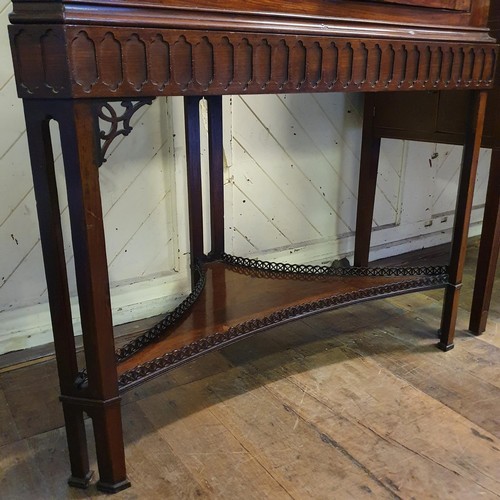 1247 - A 19th century mahogany corner cabinet, on a base on square legs united by an undertier, 104 cm wide