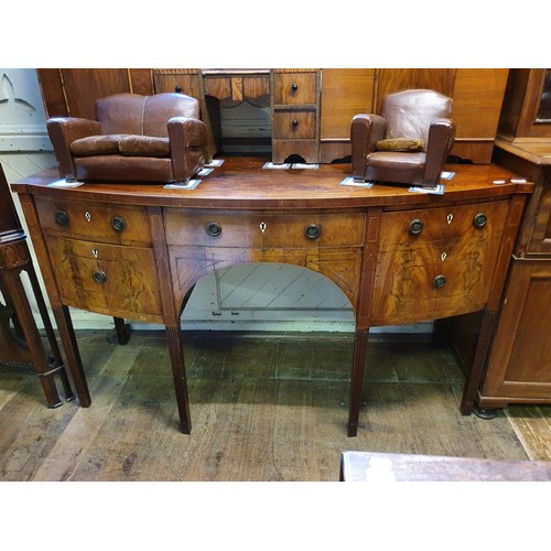 1248 - A 19th century bow front sideboard, having a single drawer, flanked by two drawers and a cupboard, 1... 