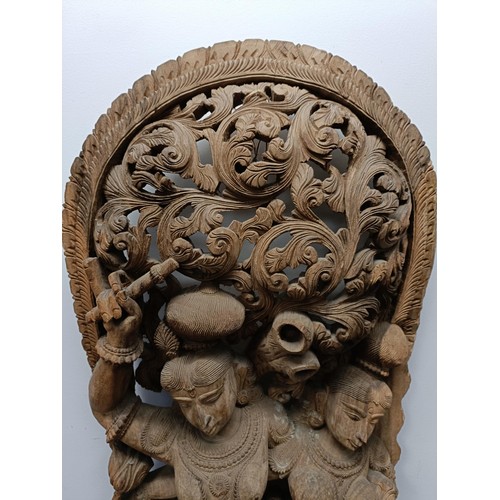 1035A - A large Indonesian wall carving, of four female figures, 155 x 70 cm