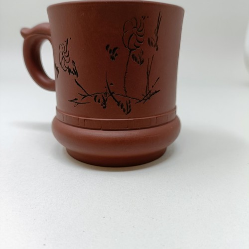 1036A - A Chinese Yixing teapot, character mark to base, 11 cm diameter, and a similar mug