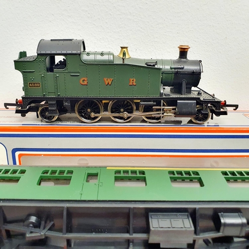 228 - A Lima OO gauge 2-6-2 locomotive, No 20 5111MW, and five Lima carriages, Nos 30 5314W, 30 5334W, 30 ... 