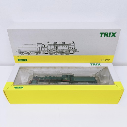 45 - A Trix HO gauge 0-8-0 locomotive and tender, No 22597, boxed  Provenance: From a vast single owner c...