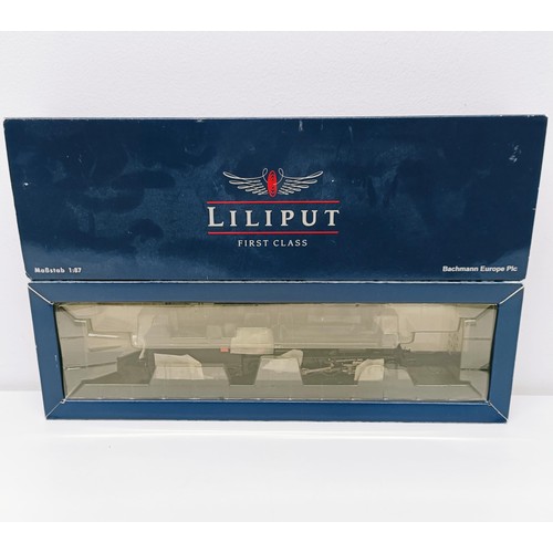 55 - A Liliput OO gauge 2-8-0 locomotive and tender, boxed No L101462, boxed  Provenance: From a vast sin...