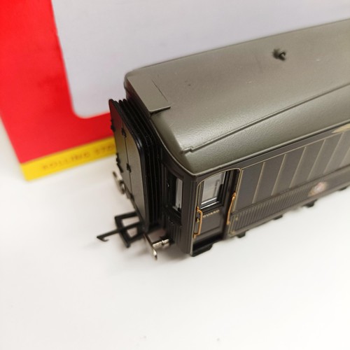 67 - A Hornby OO gauge  0-4-2 locomotive, No R2026C, boxed, and a carriage, No 447, boxed (2) Provenance:... 