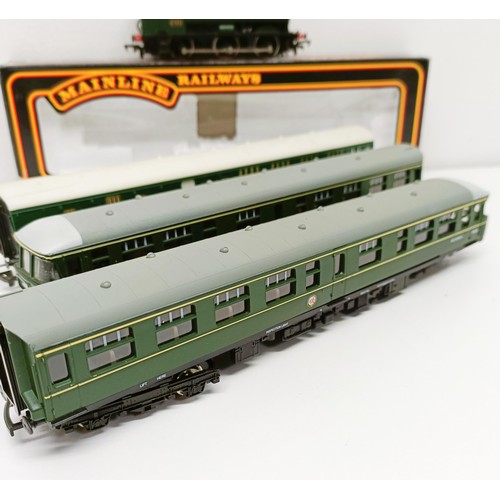 249 - A Mainline Railways OO gauge 0-6-0 locomotive, lacking tender, No 37-058, boxed, a two car train set... 