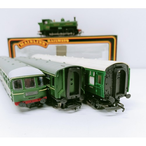 249 - A Mainline Railways OO gauge 0-6-0 locomotive, lacking tender, No 37-058, boxed, a two car train set... 