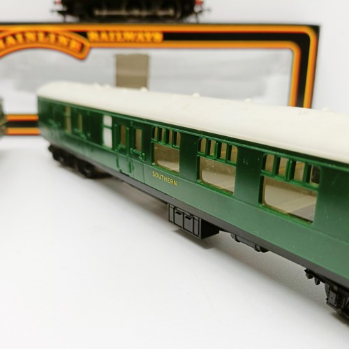 249 - A Mainline Railways OO gauge 0-6-0 locomotive, lacking tender, No 37-058, boxed, a two car train set... 