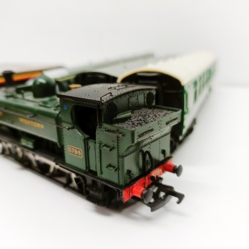 249 - A Mainline Railways OO gauge 0-6-0 locomotive, lacking tender, No 37-058, boxed, a two car train set... 