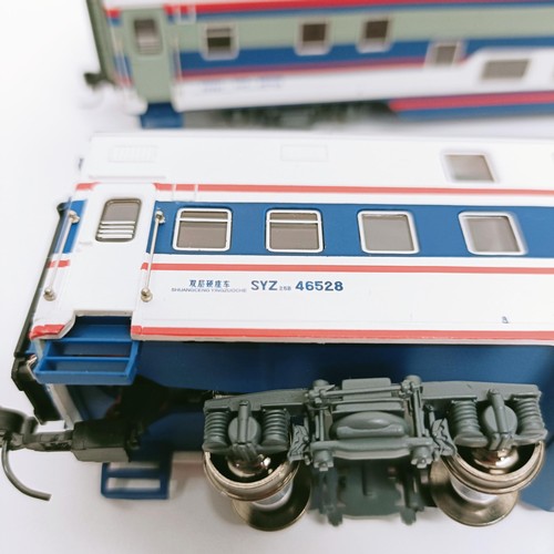 279 - A Chinese HO gauge two car carriage set, (2) (box)  Provenance: From a vast single owner collection ... 