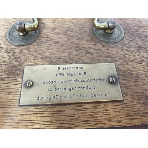 386 - An unusual piece of railway memorabilia, a bed pan gifted to Len Metcalf in recognition of his contr... 