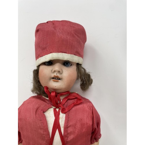 376 - A German bisque head doll, and a dolls head (2)