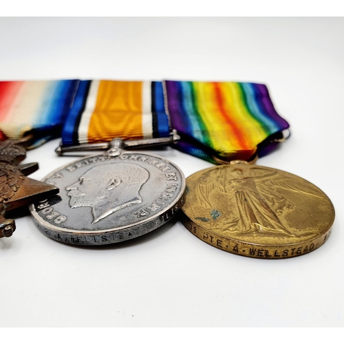 428 - A group of four medals, awarded to 13801 Pte A G Wellsteed 7/Wiltshire Regiment, comprising a Milita... 