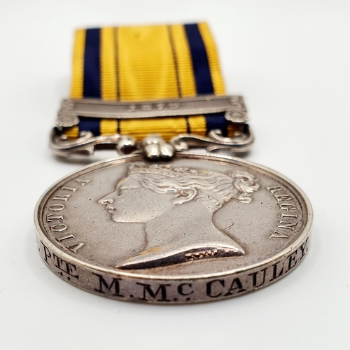 448 - A South Africa medal, awarded to 1249 Pte M McCauley, 99th Foot, with 1879 clasp  
Provenance: From ... 