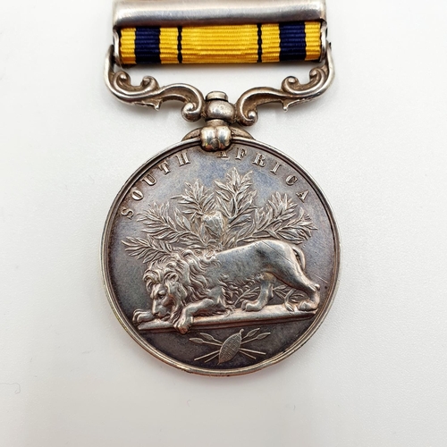 448 - A South Africa medal, awarded to 1249 Pte M McCauley, 99th Foot, with 1879 clasp  
Provenance: From ... 