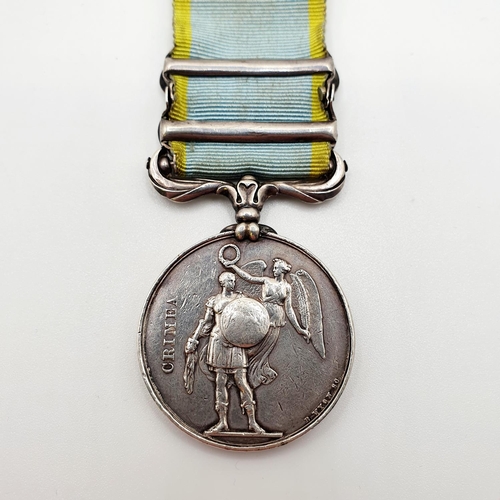 454 - A Crimea medal, named to Thos Watt 11th Hussars, with Balaklava and Sebastopol clasps and regimental... 