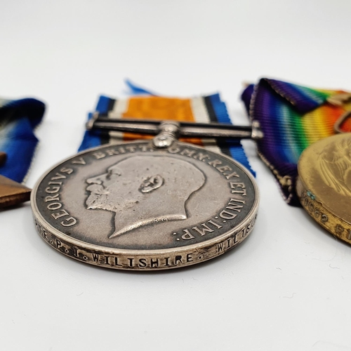 467 - A 1914-15 Star trio, awarded to 11082 Pte P T Wiltshire, Wiltshire Regiment  Provenance: From a coll... 