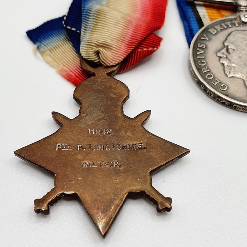 467 - A 1914-15 Star trio, awarded to 11082 Pte P T Wiltshire, Wiltshire Regiment  Provenance: From a coll... 