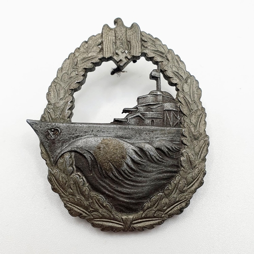 480 - A German WWII era Kriegsmarine badge, marked S.H.u.Co. to the reverse  
Provenance: From a collectio... 