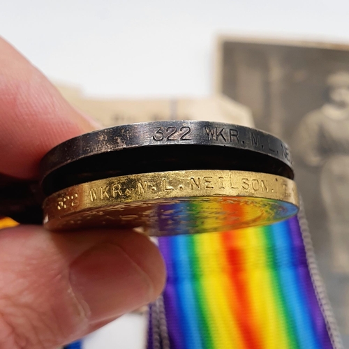 484 - A British War medal and Victory medal pair, awarded to 322 Wkr M L Neilson QMAAC, and a photograph P... 