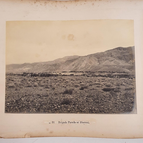 541 - An album of late 19th century monochrome photographs, the Tochi Valley Expedition, the inside front ... 