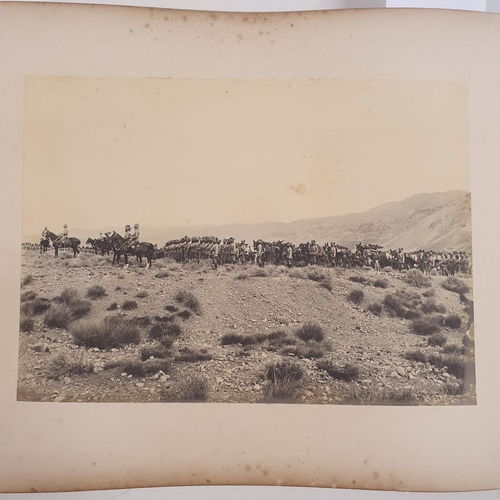 541 - An album of late 19th century monochrome photographs, the Tochi Valley Expedition, the inside front ... 