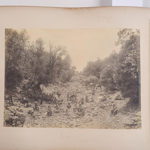 541 - An album of late 19th century monochrome photographs, the Tochi Valley Expedition, the inside front ... 