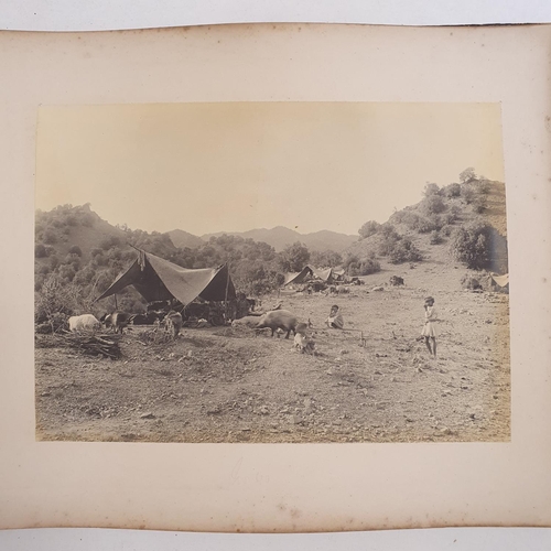 541 - An album of late 19th century monochrome photographs, the Tochi Valley Expedition, the inside front ... 