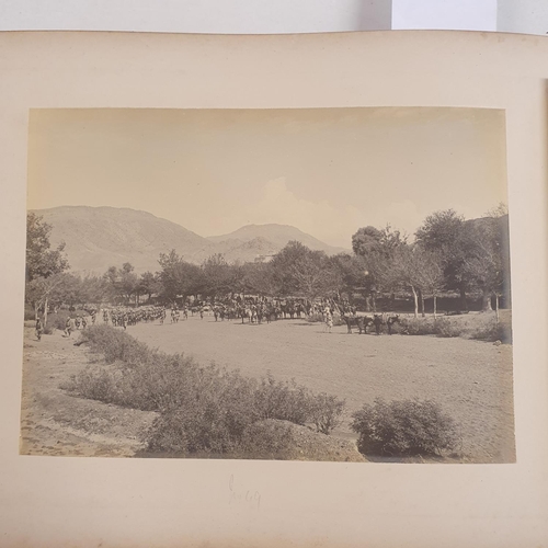 541 - An album of late 19th century monochrome photographs, the Tochi Valley Expedition, the inside front ... 