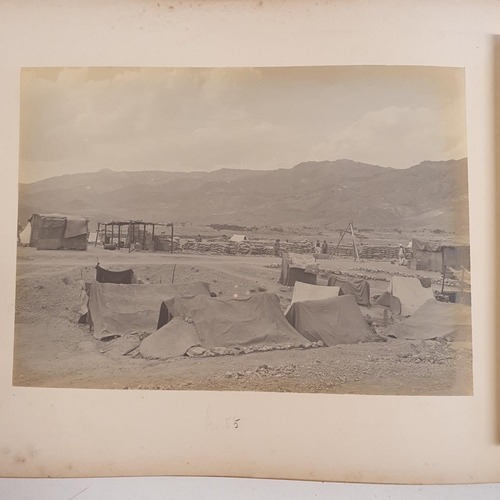 541 - An album of late 19th century monochrome photographs, the Tochi Valley Expedition, the inside front ... 