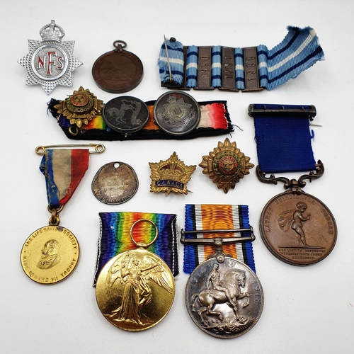 544 - A group of three medals, comprising a British War medal and Victory medal pair, awarded to 2563 Pte ... 